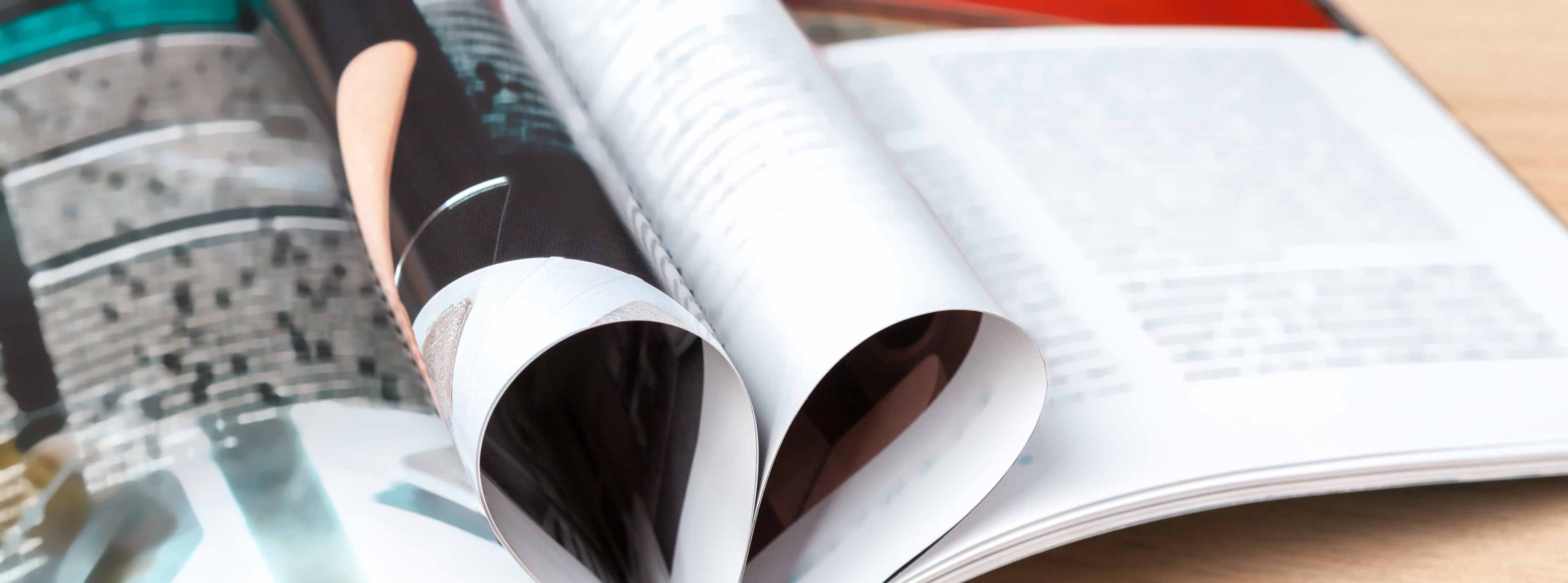 pages of book curved into a heart shape close